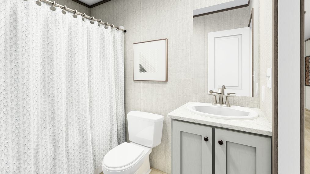 The LEGEND 16X72 COASTAL BREEZE I Guest Bathroom. This Manufactured Mobile Home features 3 bedrooms and 2 baths.