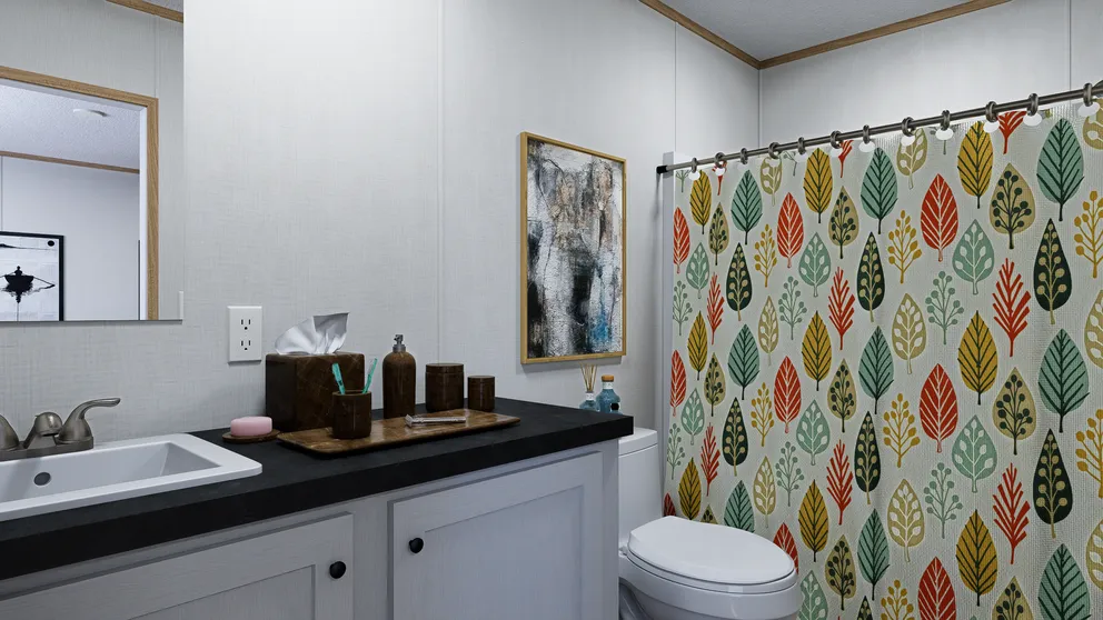 The LUMEN Primary Bathroom. This Manufactured Mobile Home features 3 bedrooms and 2 baths.