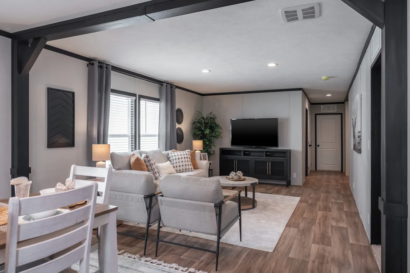 The ABSOLUTE VALUE Den. This Manufactured Mobile Home features 4 bedrooms and 2 baths.