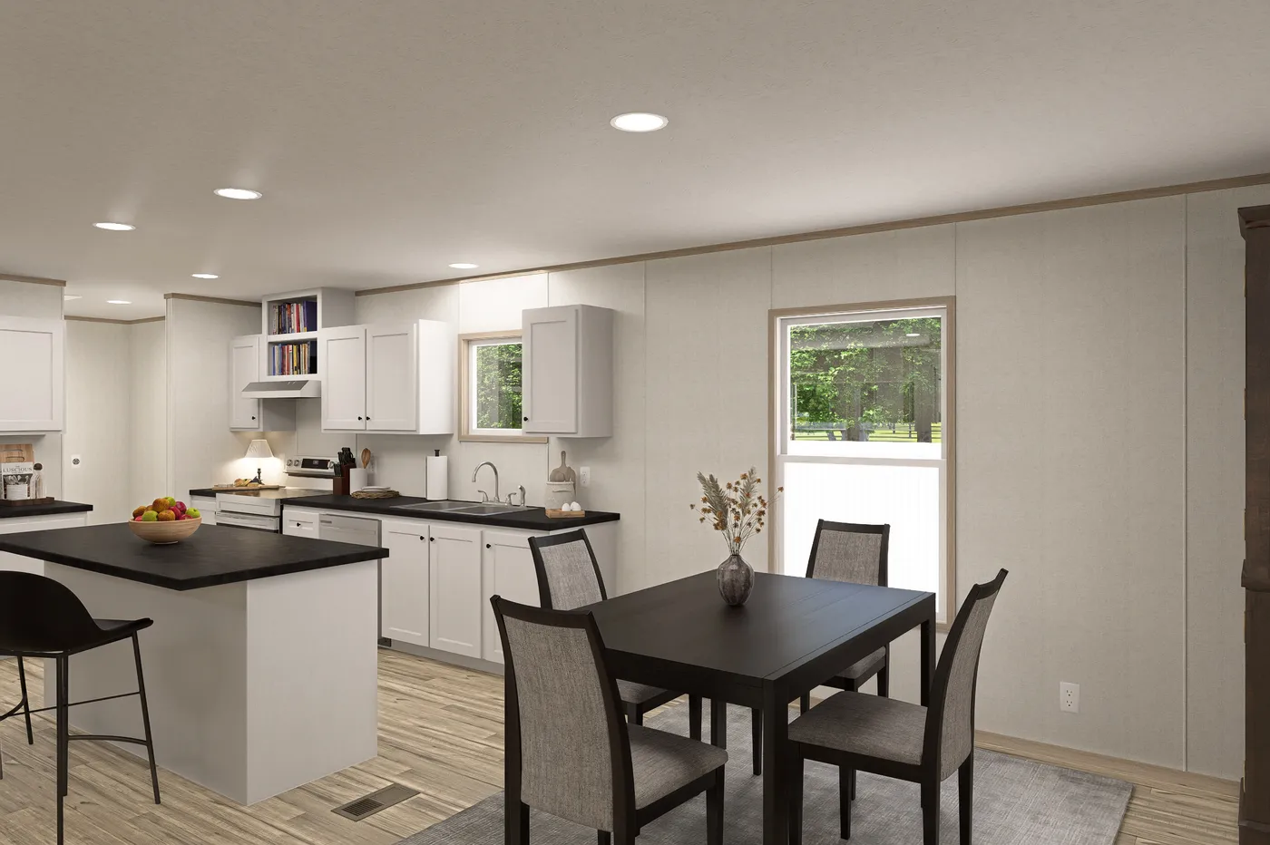 The THE EAGLE 76 Dining Area. This Manufactured Mobile Home features 5 bedrooms and 2 baths.