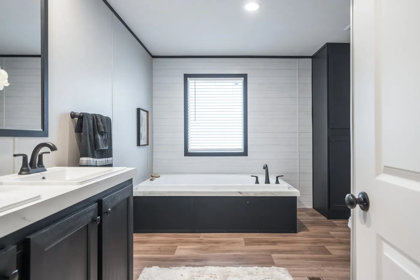 The ABSOLUTE VALUE Primary Bathroom. This Manufactured Mobile Home features 4 bedrooms and 2 baths.