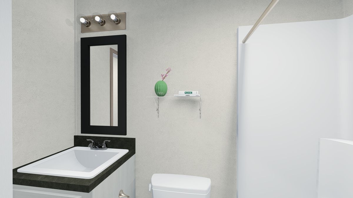 The 6616-4779 THE PULSE Guest Bathroom. This Manufactured Mobile Home features 3 bedrooms and 2 baths.