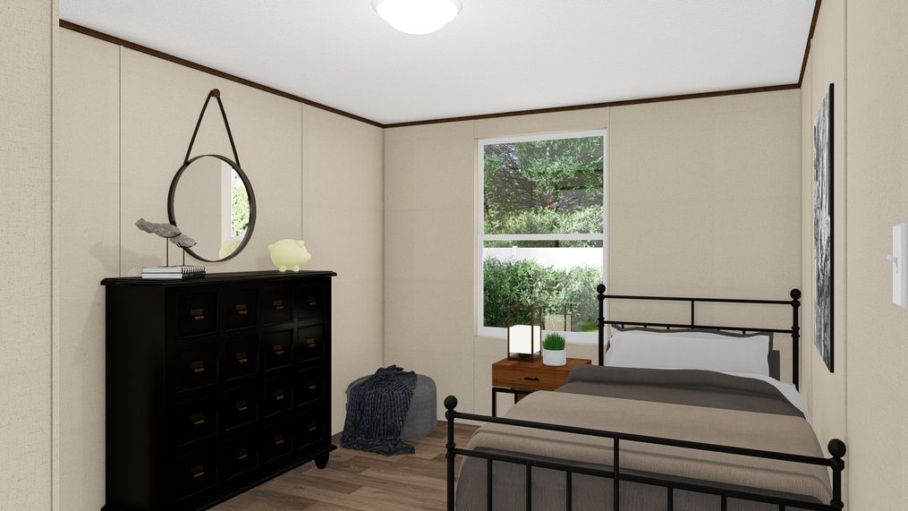 The MARVELOUS 3 Guest Bedroom. This Manufactured Mobile Home features 3 bedrooms and 2 baths.