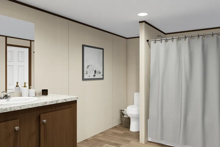 The PRIDE Primary Bathroom. This Manufactured Mobile Home features 4 bedrooms and 2 baths.