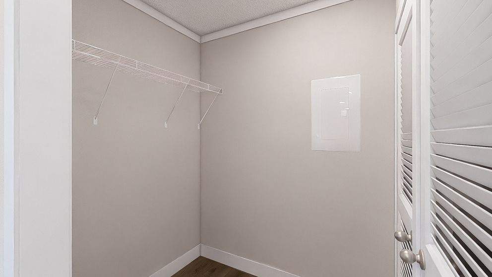 The RHYTHM NATION Utility Room. This Manufactured Mobile Home features 3 bedrooms and 2 baths.