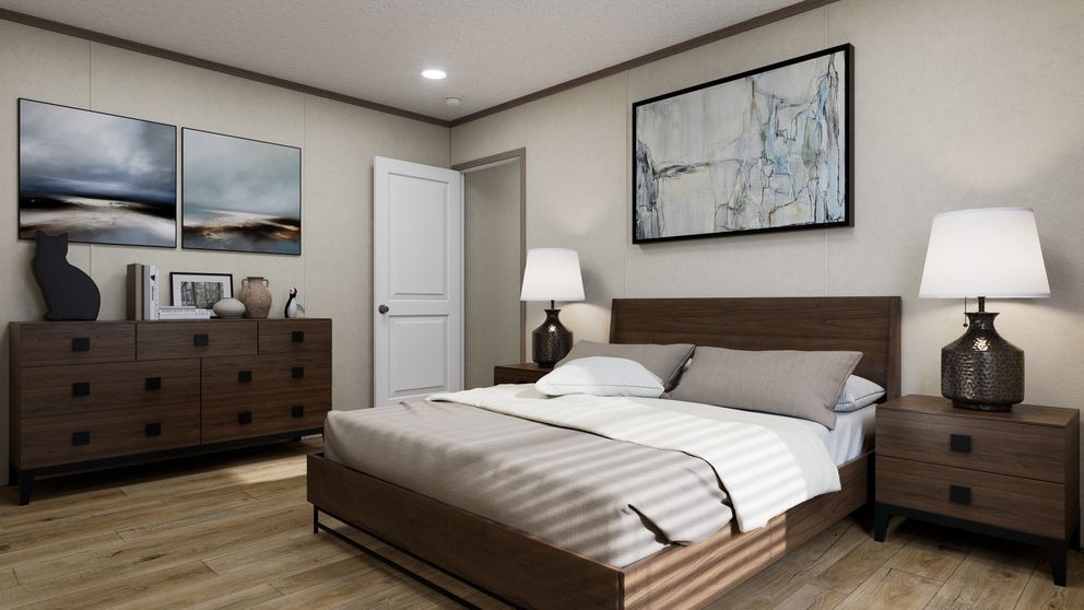 The 7216-CC01 CORNERSTONE 72 Primary Bedroom. This Manufactured Mobile Home features 3 bedrooms and 2 baths.