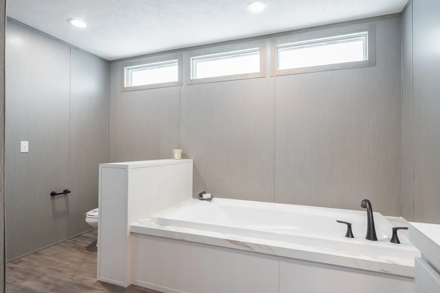 The BLUEBONNET BREEZE Primary Bathroom. This Manufactured Mobile Home features 3 bedrooms and 2 baths.