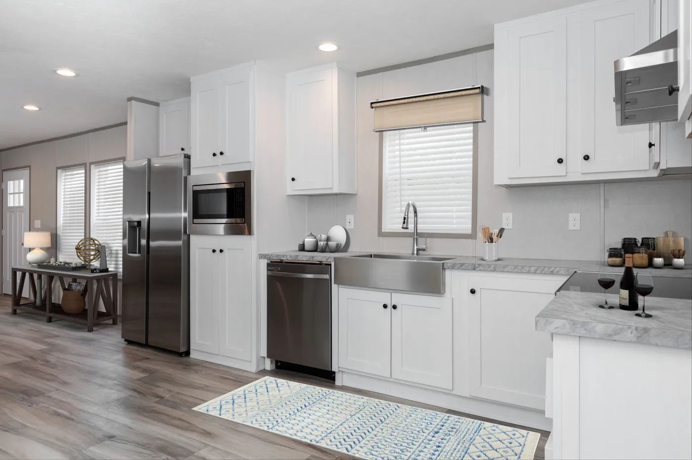 The THE ULTIMATE SHOWER Kitchen. This Manufactured Mobile Home features 3 bedrooms and 2 baths.