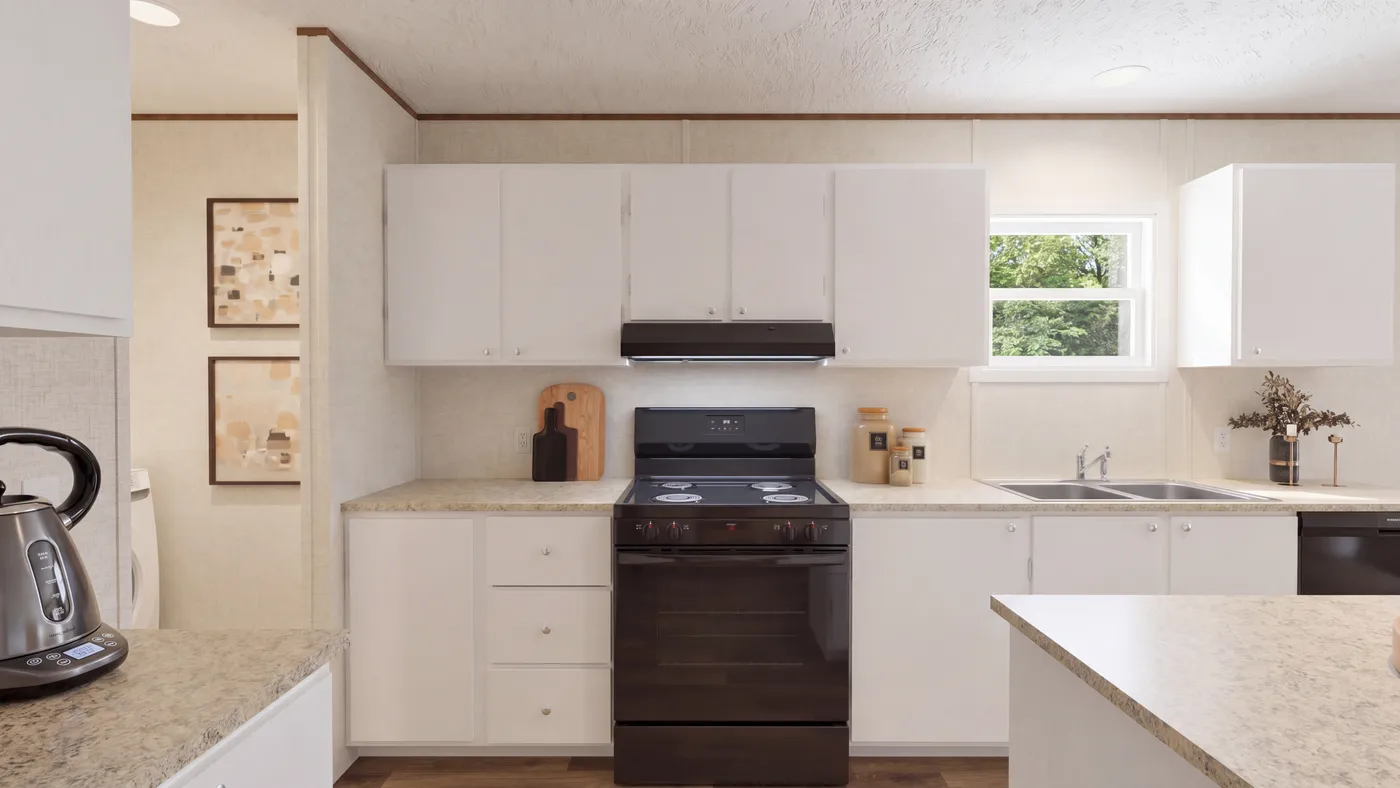 The SPRUCE Kitchen. This Manufactured Mobile Home features 3 bedrooms and 2 baths.