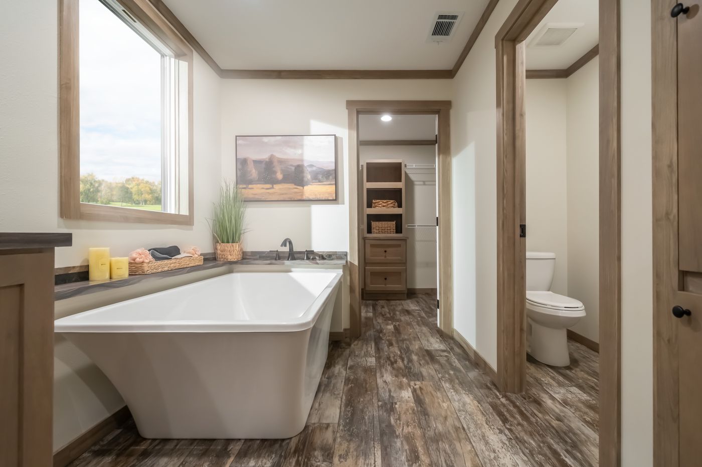 The BOUJEE PREMIER Primary Bathroom. This Manufactured Mobile Home features 4 bedrooms and 2 baths.