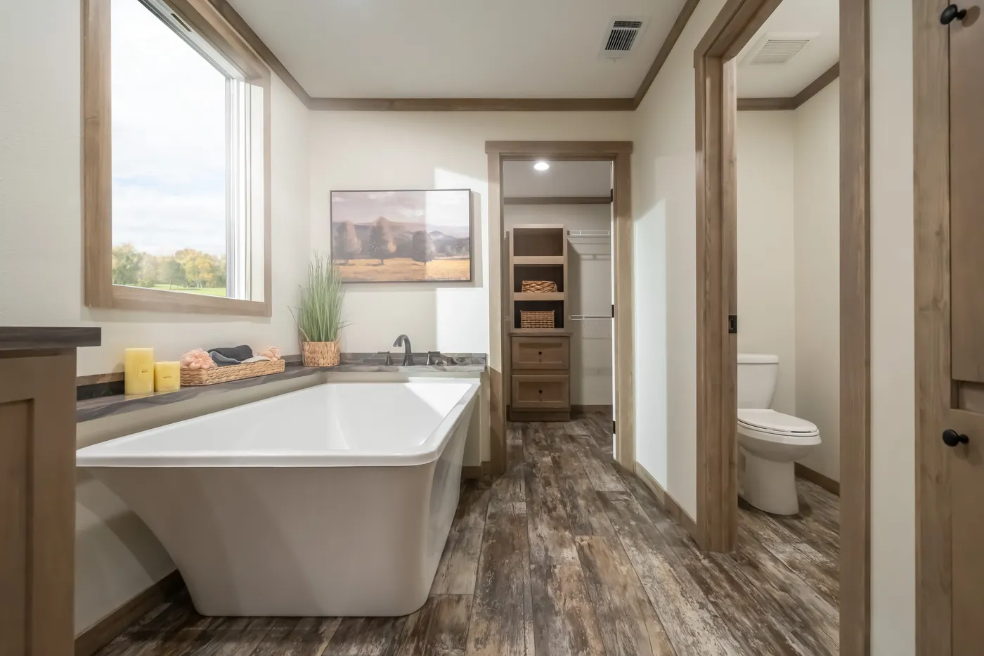The BOUJEE PREMIER Primary Bathroom. This Manufactured Mobile Home features 4 bedrooms and 2 baths.