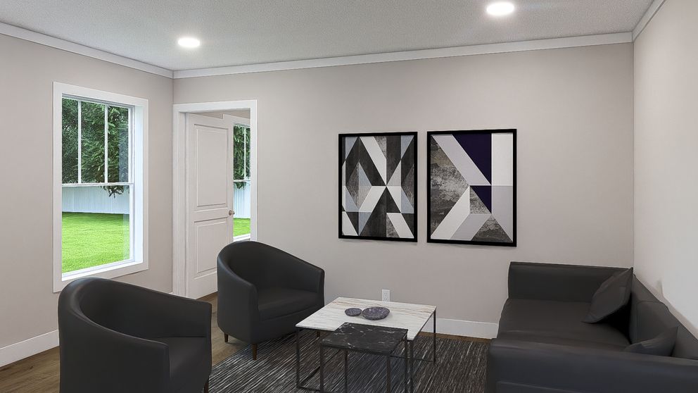 The RHYTHM NATION Living Room. This Manufactured Mobile Home features 3 bedrooms and 2 baths.