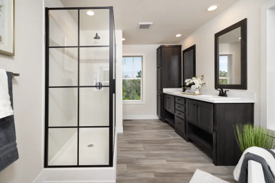 The STRATFORD PL 6630-MS062 SECT Primary Bathroom. This Manufactured Mobile Home features 3 bedrooms and 2 baths.