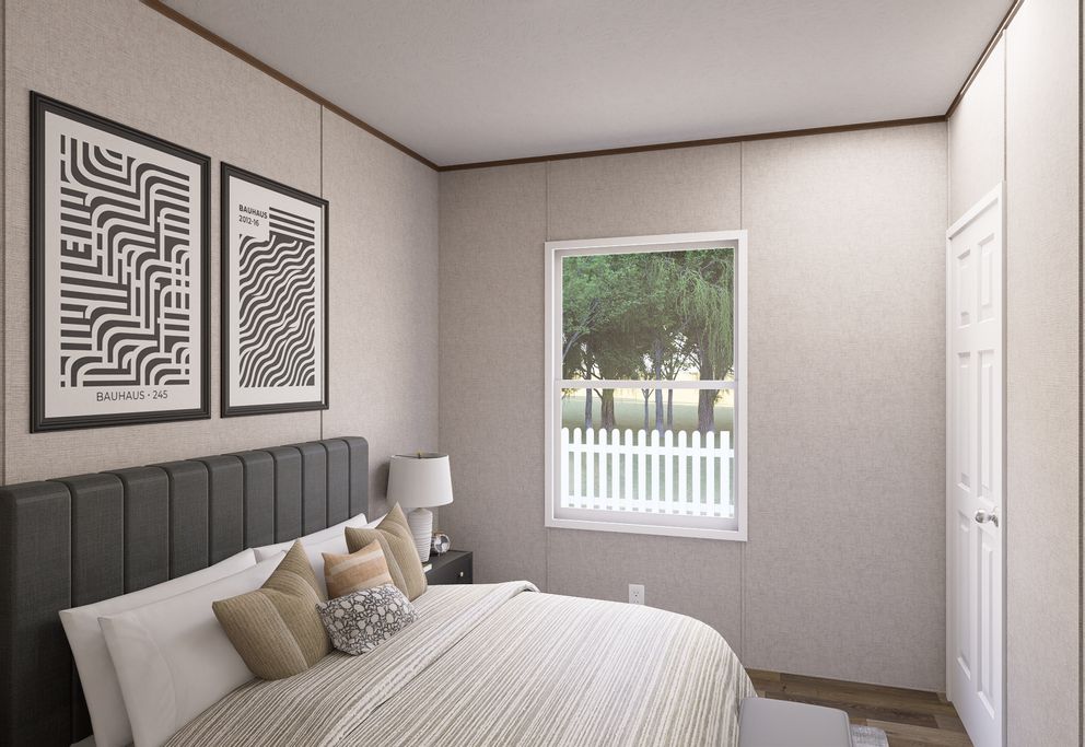 The ASPEN Guest Bedroom. This Manufactured Mobile Home features 3 bedrooms and 2 baths.
