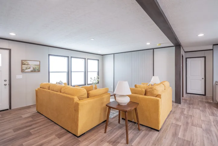 The EMPOWER Living Room. This Manufactured Mobile Home features 4 bedrooms and 2 baths.