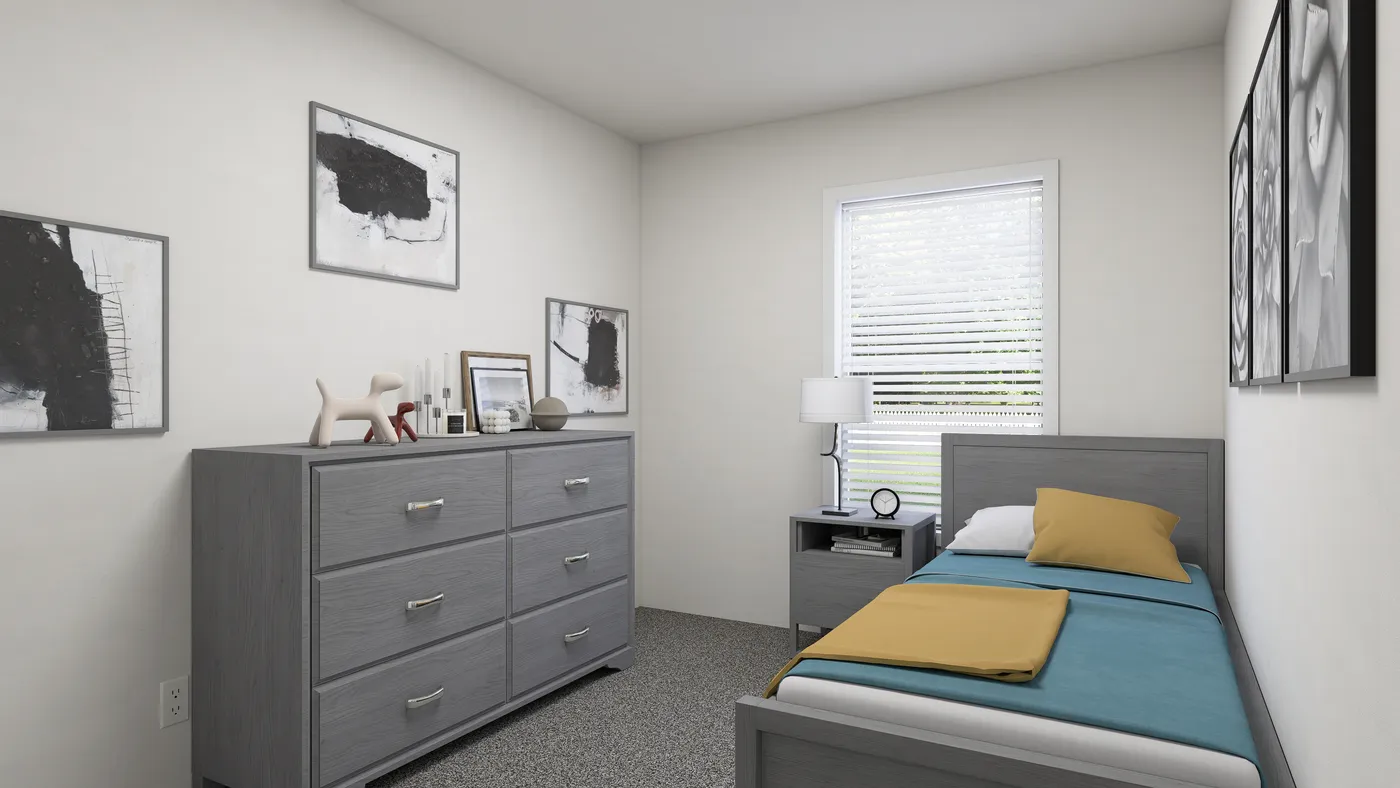 The SLE 561F Bedroom. This Manufactured Mobile Home features 3 bedrooms and 2 baths.