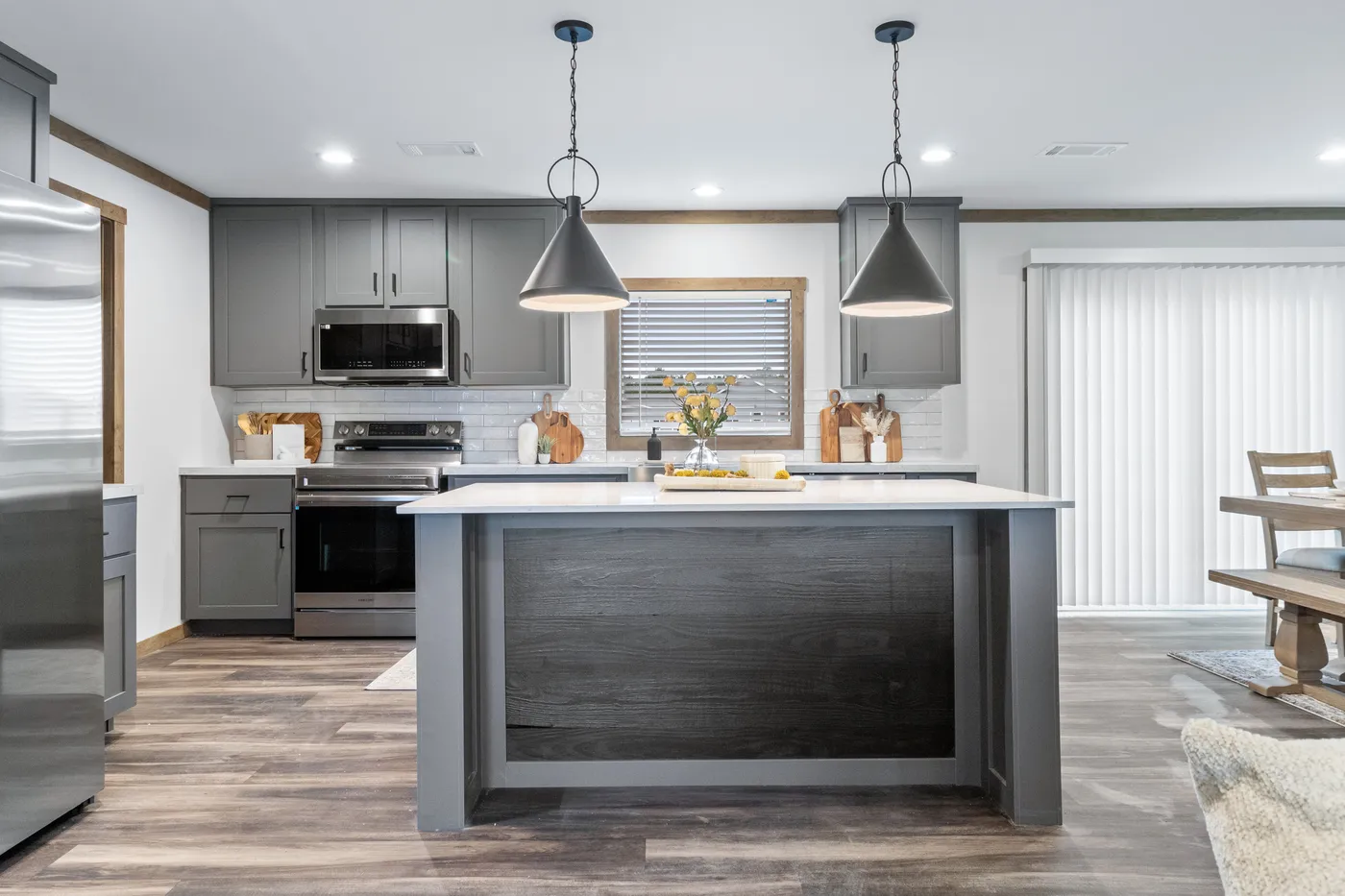 The EVERETT ELITE Kitchen. This Manufactured Mobile Home features 4 bedrooms and 3 baths.