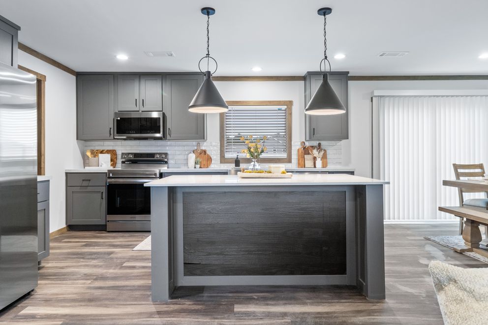 The EVERETT ELITE Kitchen. This Manufactured Mobile Home features 4 bedrooms and 3 baths.