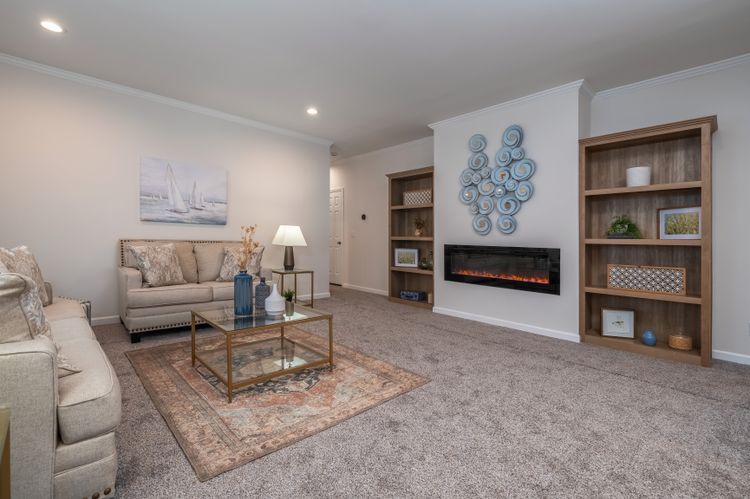 The 2062 CLASSIC Living Room. This Manufactured Mobile Home features 3 bedrooms and 2 baths.