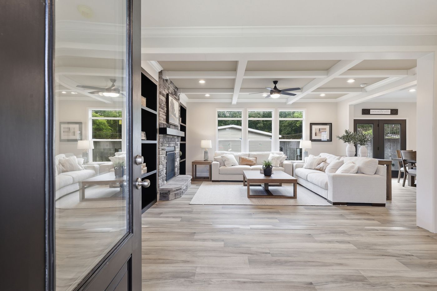 The THE SUMMIT Living Room. This Manufactured Mobile Home features 3 bedrooms and 2 baths.