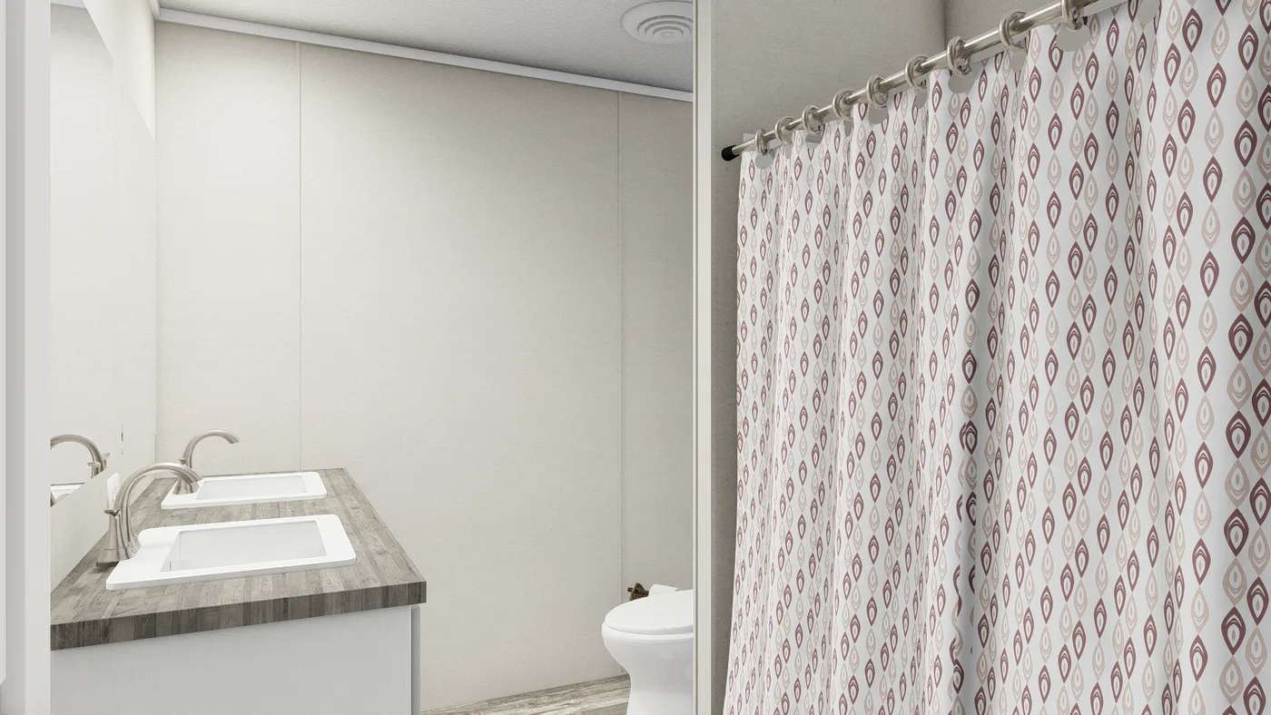 The ULTRA BREEZE 28X52 Guest Bathroom. This Manufactured Mobile Home features 3 bedrooms and 2 baths.