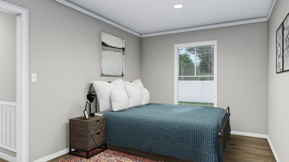 The THE FRANKLIN Bedroom. This Manufactured Mobile Home features 3 bedrooms and 2 baths.