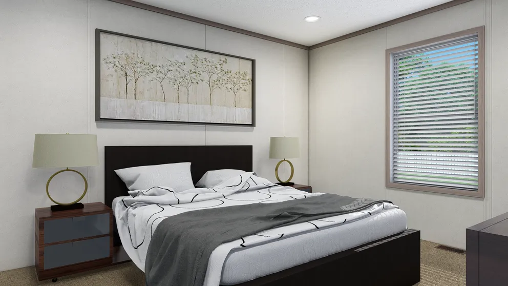 The 4028-E751 THE PULSE Primary Bedroom. This Manufactured Mobile Home features 3 bedrooms and 2 baths.