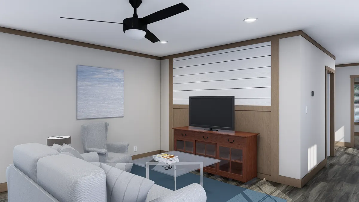 The TRINITY 76 Living Room. This Manufactured Mobile Home features 3 bedrooms and 2 baths.