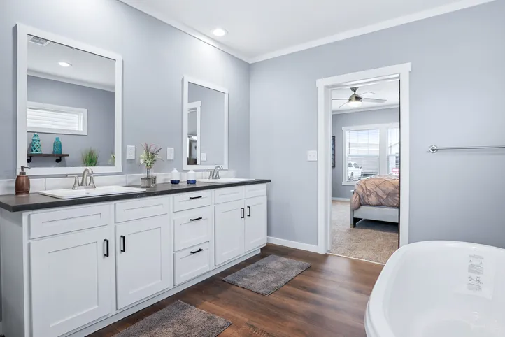 The THE ATLAS Primary Bathroom. This Manufactured Mobile Home features 4 bedrooms and 3 baths.
