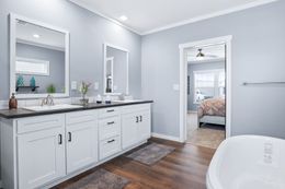 The THE ATLAS Primary Bathroom. This Manufactured Mobile Home features 4 bedrooms and 3 baths.