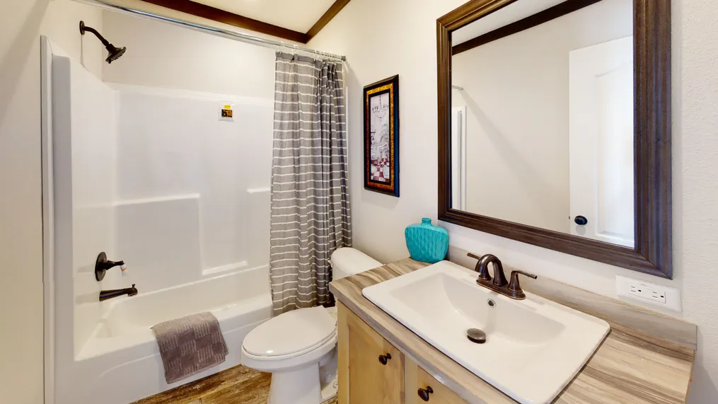 The BOUJEE XL 2 Guest Bathroom. This Manufactured Mobile Home features 4 bedrooms and 3 baths.