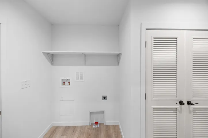 The LULAMAE 3 Utility Room. This Manufactured Mobile Home features 3 bedrooms and 2 baths.