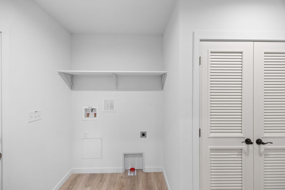 The LULAMAE 3 Utility Room. This Manufactured Mobile Home features 3 bedrooms and 2 baths.