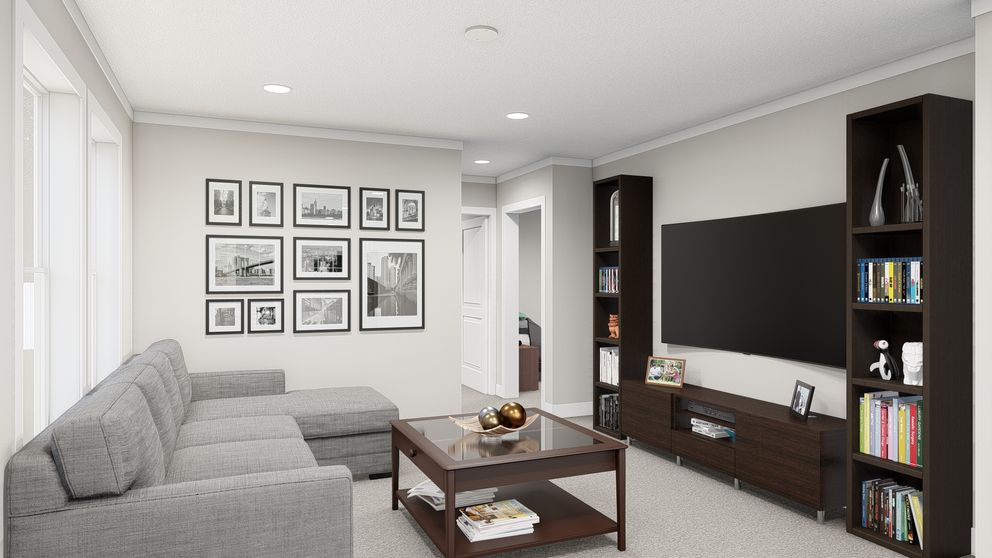 The HERE COMES THE SUN Living Room. This Manufactured Mobile Home features 3 bedrooms and 2 baths.