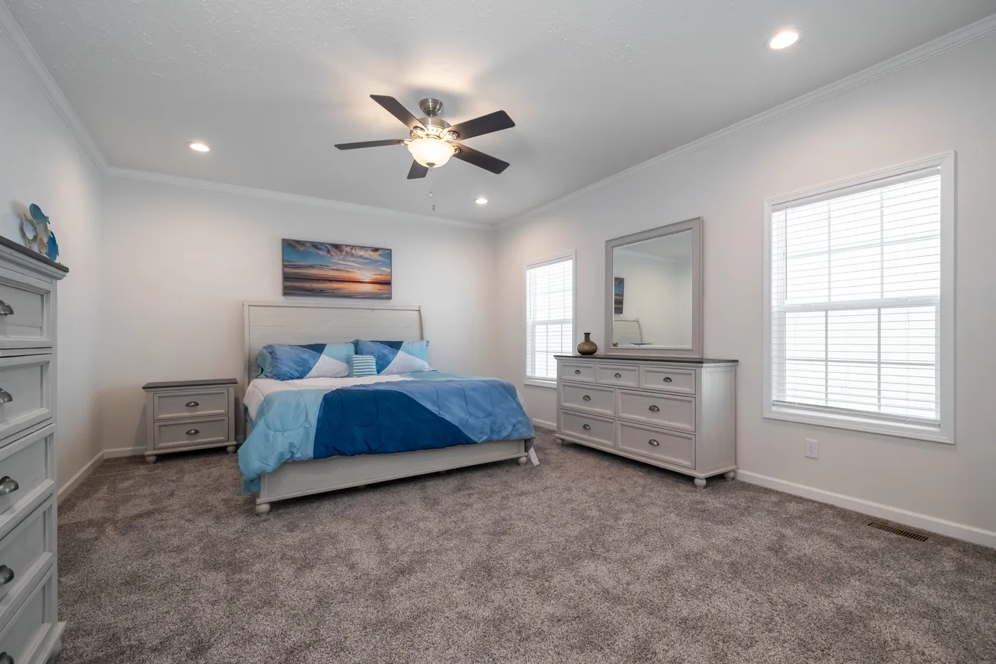 The 3458 MOD 76X32 CAROLINA RAELYN Primary Bedroom. This Modular Home features 4 bedrooms and 3 baths.