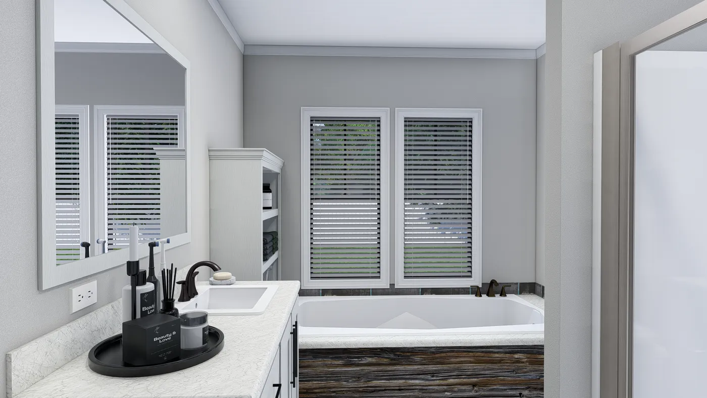 The THE HOLLYWOOD Primary Bathroom. This Manufactured Mobile Home features 3 bedrooms and 2 baths.
