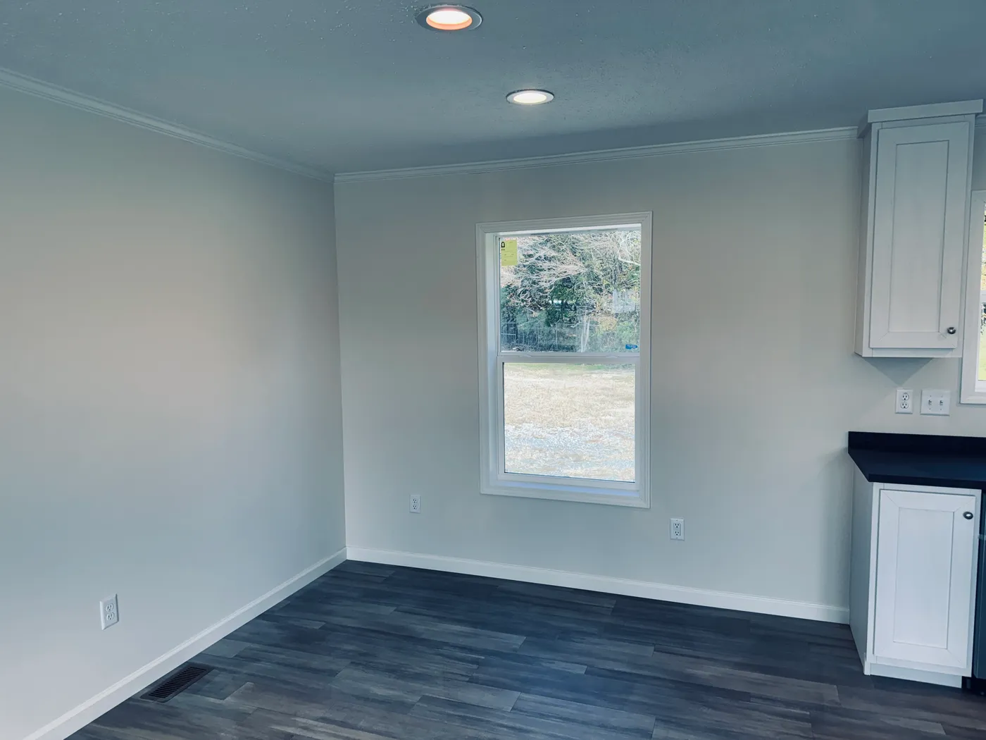 The TOURMALINE 7628-649 Dining Area. This Manufactured Mobile Home features 4 bedrooms and 2 baths.