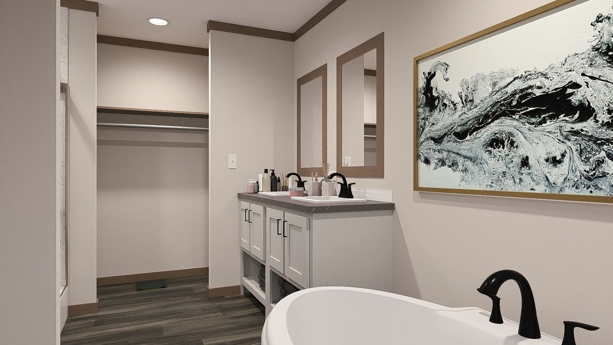 The LEXI Primary Bathroom. This Manufactured Mobile Home features 3 bedrooms and 2 baths.