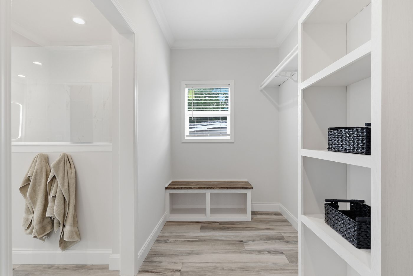 The THE SUMMIT Primary Bedroom. This Manufactured Mobile Home features 3 bedrooms and 2 baths.