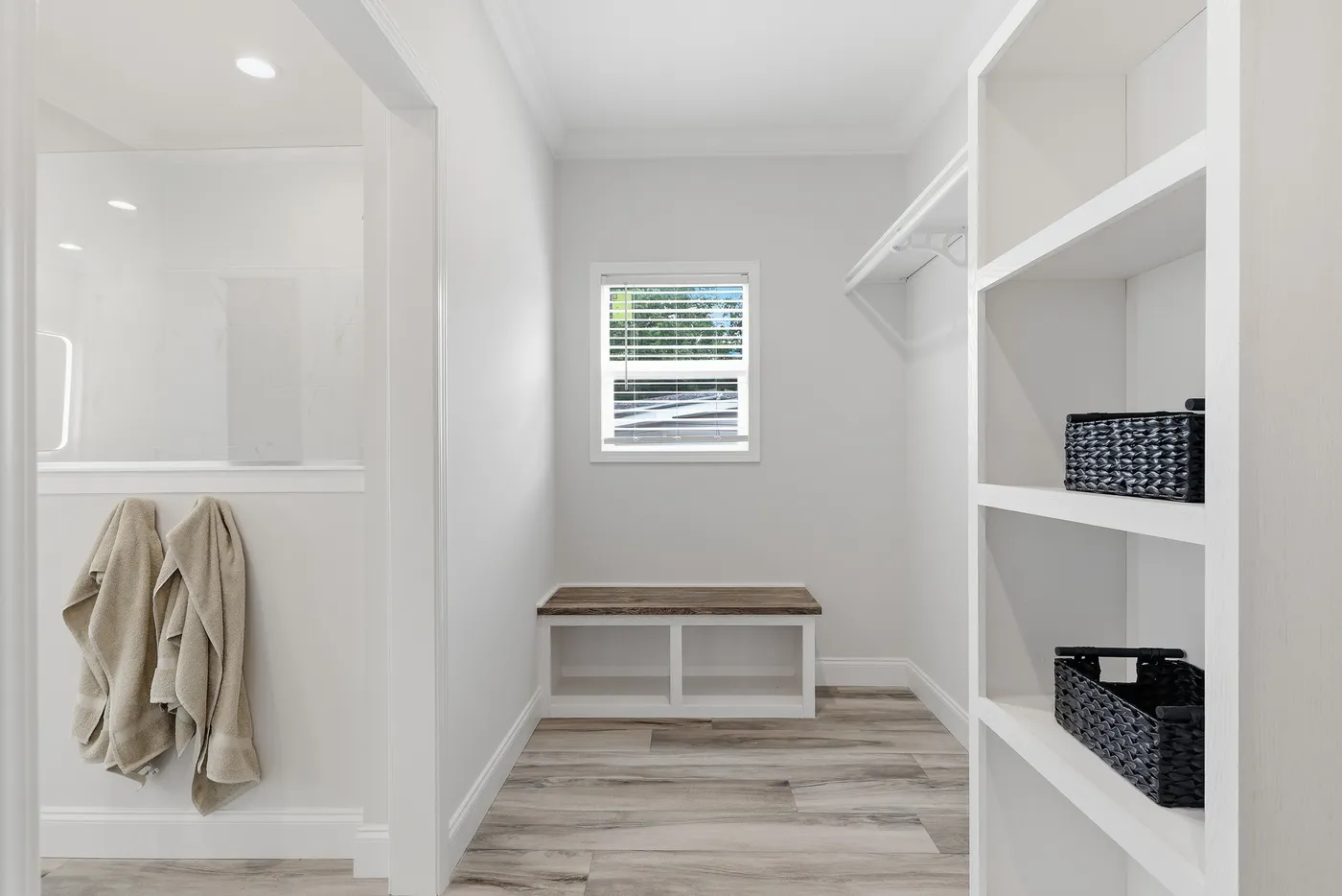The THE SUMMIT Primary Bedroom. This Manufactured Mobile Home features 3 bedrooms and 2 baths.