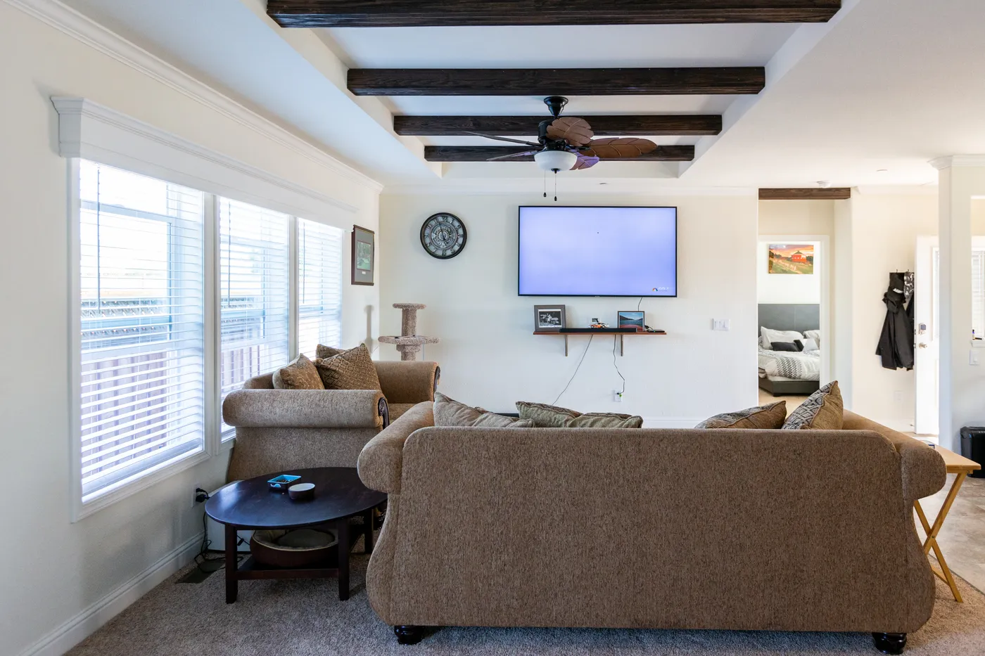 The CORONADO 24563C Living Room. This Manufactured Mobile Home features 3 bedrooms and 2 baths.