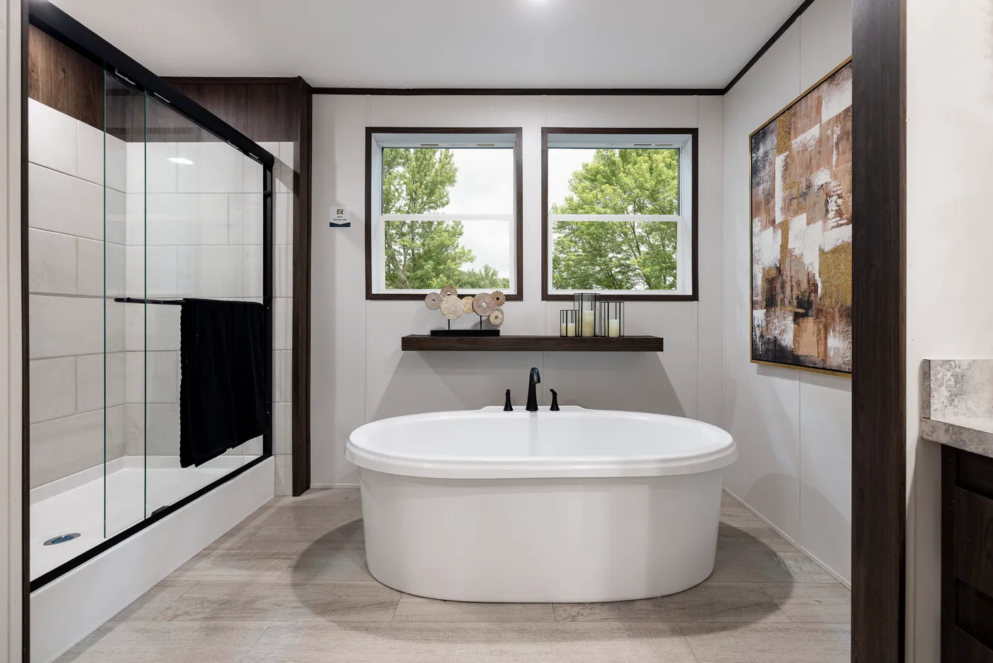 The CRESTWOOD Primary Bathroom. This Manufactured Mobile Home features 3 bedrooms and 2 baths.