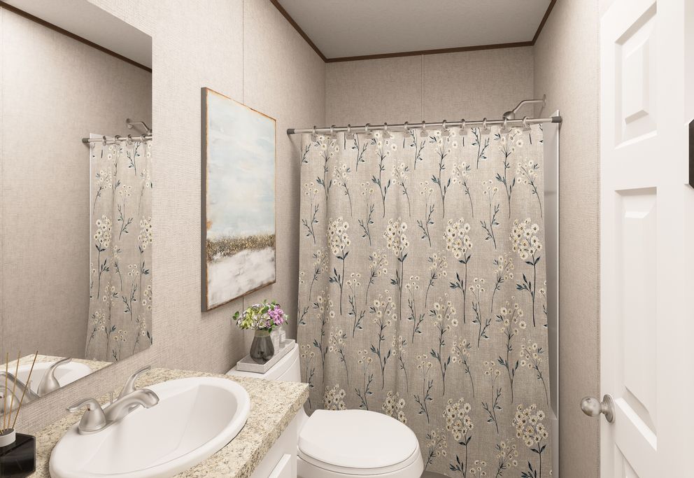 The MAPLE Guest Bathroom. This Manufactured Mobile Home features 3 bedrooms and 2 baths.