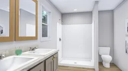 The LOVELY DAY Primary Bathroom. This Manufactured Mobile Home features 4 bedrooms and 2 baths.