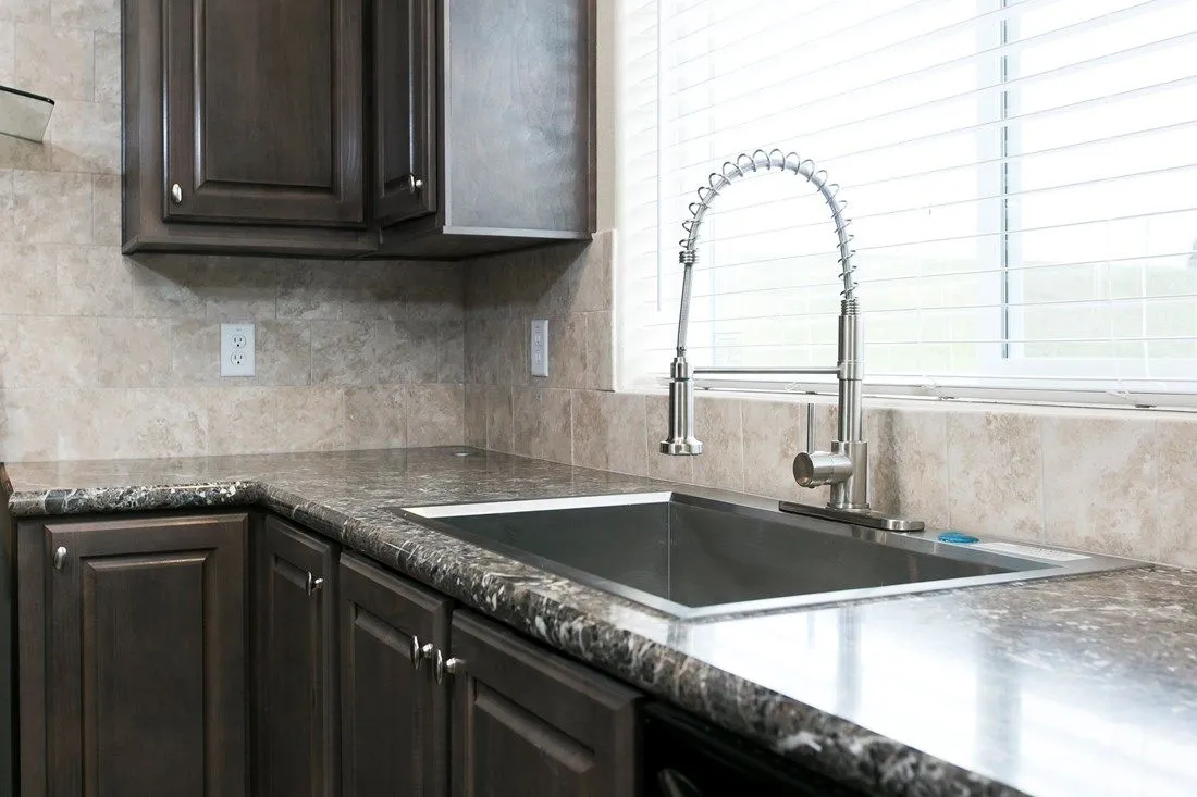 The 2023 COLUMBIA RIVER (NEW) Kitchen. This Manufactured Mobile Home features 3 bedrooms and 2 baths.