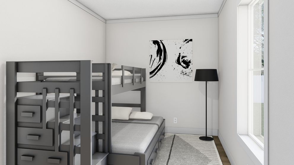 The BORN TO RUN Guest Bedroom. This Manufactured Mobile Home features 2 bedrooms and 2 baths.