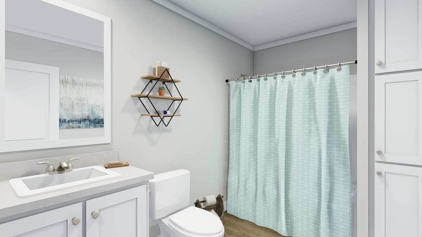 The REMINGTON Guest Bathroom. This Manufactured Mobile Home features 3 bedrooms and 2 baths.