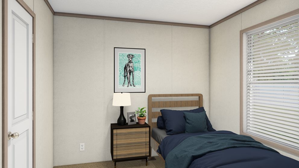 The 7616-4710 THE PULSE Guest Bedroom. This Manufactured Mobile Home features 3 bedrooms and 2 baths.