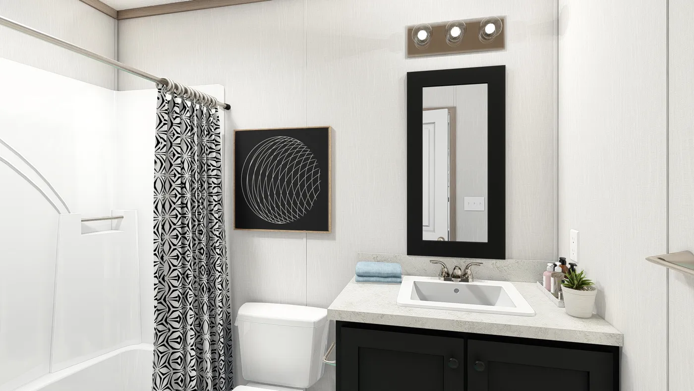 The 7616-4773P THE PULSE Primary Bathroom. This Manufactured Mobile Home features 3 bedrooms and 2 baths.