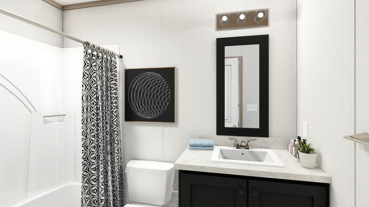The 7616-4773P THE PULSE Primary Bathroom. This Manufactured Mobile Home features 3 bedrooms and 2 baths.